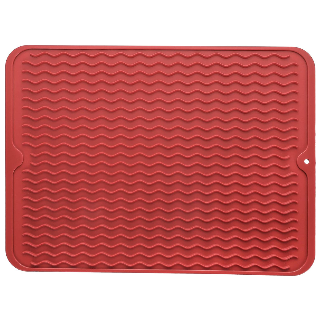Flexible silicone drying mat, easy to roll and store, perfect for small kitchens and dish drying needs.