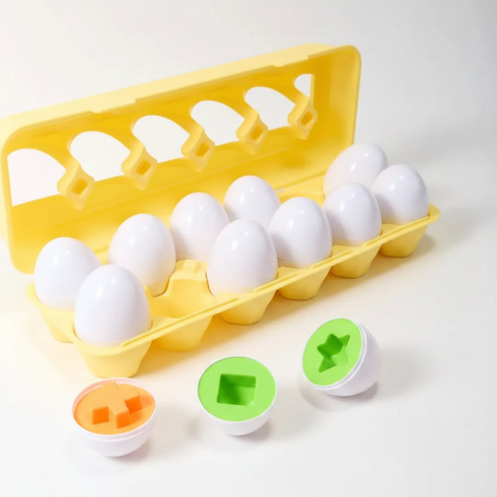 Child sorting vibrant geometric shapes into a matching toy. Enhances toddler learning, fine motor skills, & sensory play.