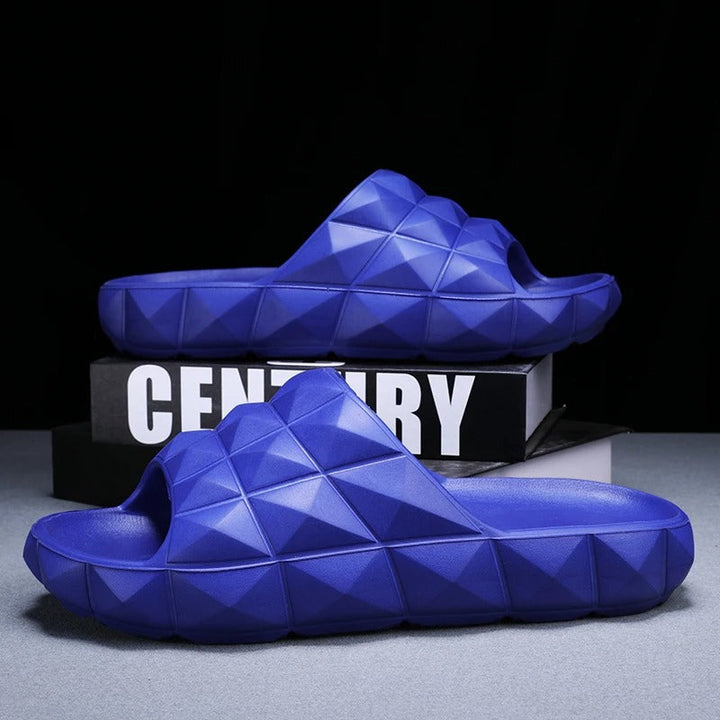 Comfortable men's slip-on slides with modern geometric texture.