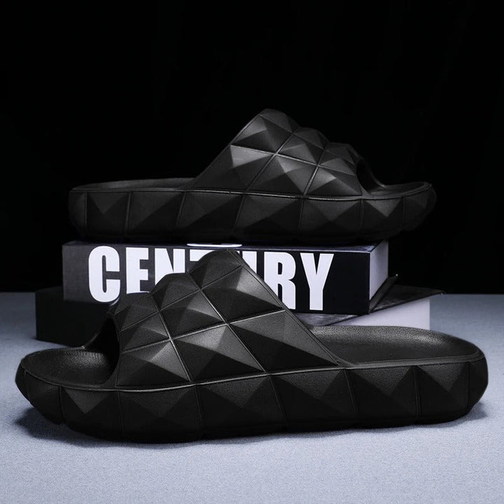 Modern men's footwear: geometric textured slides for ultimate comfort & style.