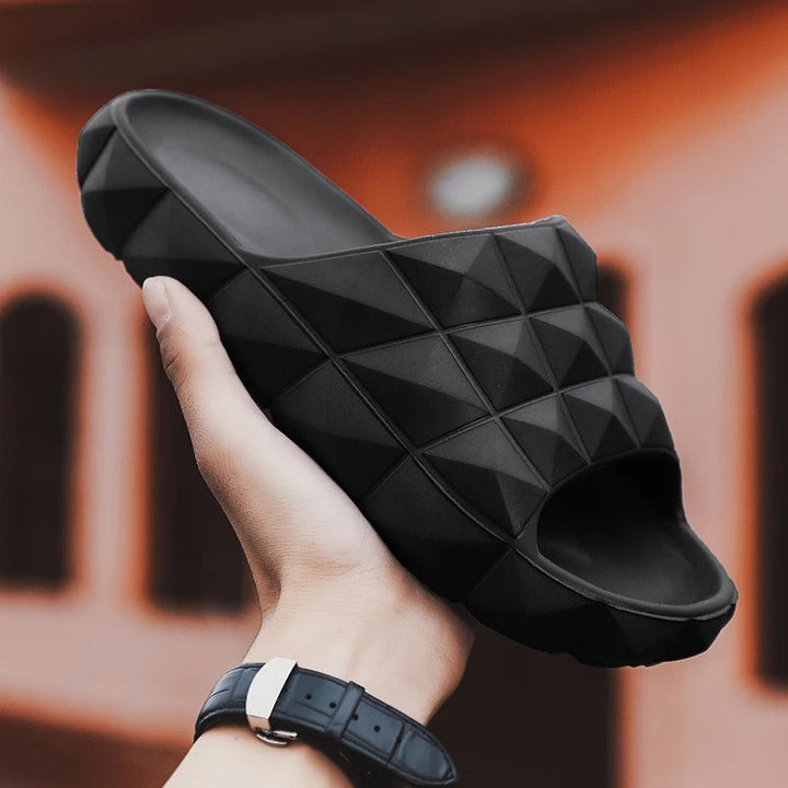 Slip into comfort with these men's geometric textured casual slides.