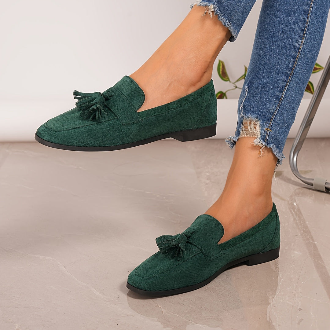 Women's comfortable green tassel loafers, perfect for office, casual, & everyday fashion.