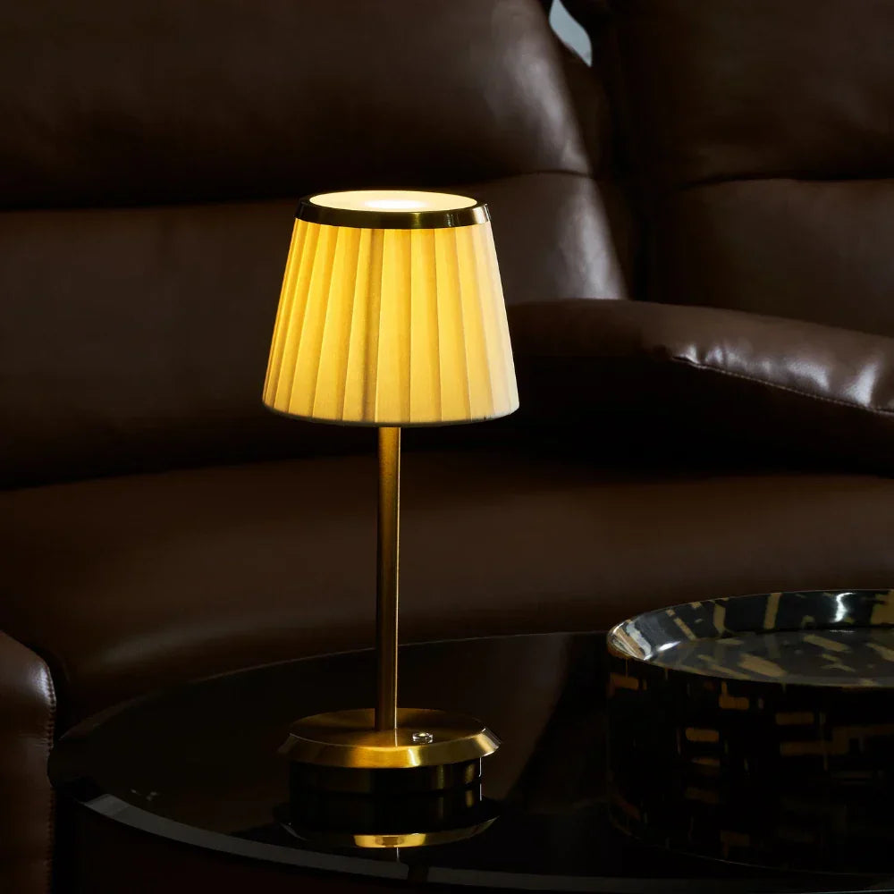 Modern rechargeable table lamp with fabric shade & dimmable LED light. Perfect cordless lighting for any modern decor.