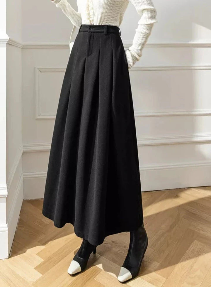 Chic pleated A-line midi skirt for women, perfect for elegant autumn fashion.