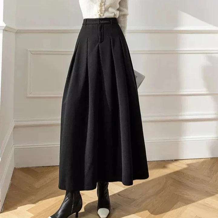 Comfortable & elegant pleated A-line midi skirt for women, ideal for autumn style.