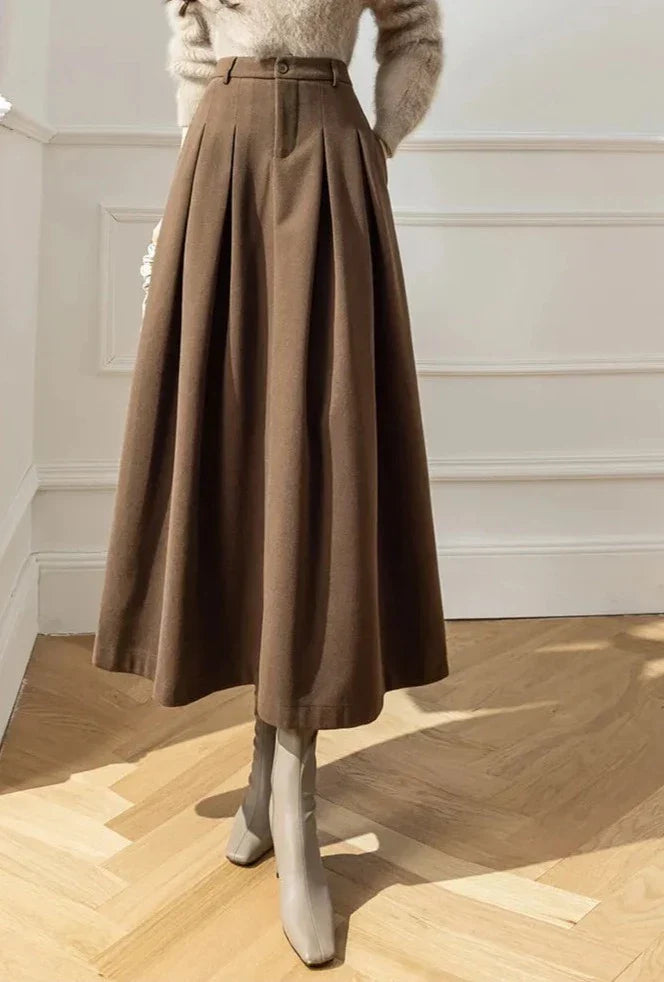 Flowy A-line pleated midi skirt for women, comfortable autumn & winter fashion.