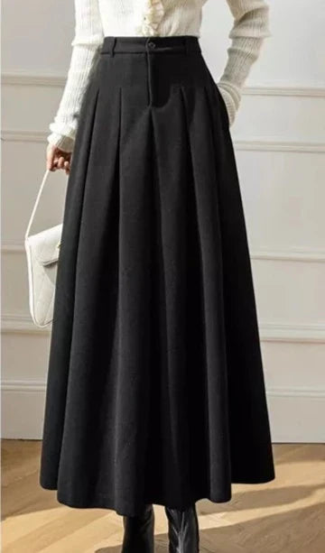 Versatile women's A-line midi skirt, pleated design for autumn & winter fashion.