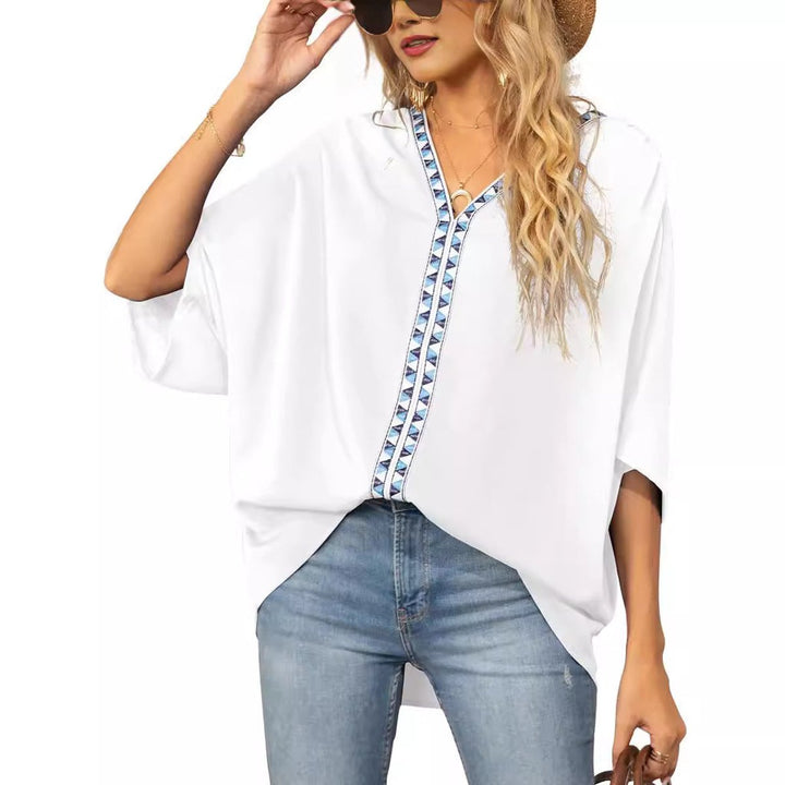 Women's boho embroidered oversized V-neck tunic top. Casual spring/summer style, comfortable fit.