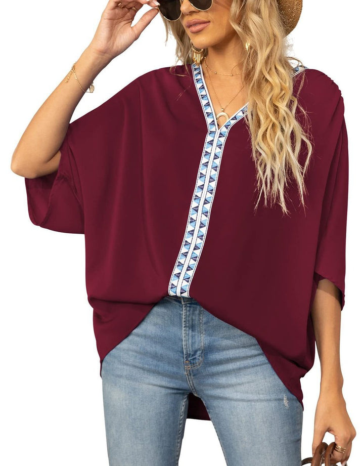 Women's embroidered boho V-neck tunic, oversized & comfortable, perfect for spring/summer fashion.