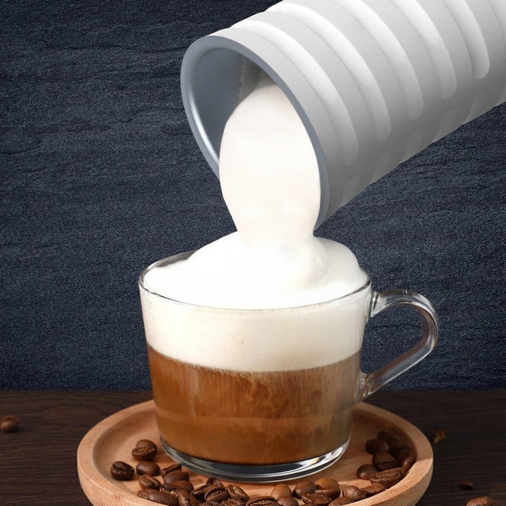 Home barista electric milk frother. Creates perfect cappuccino foam & latte art. Easy kitchen appliance.