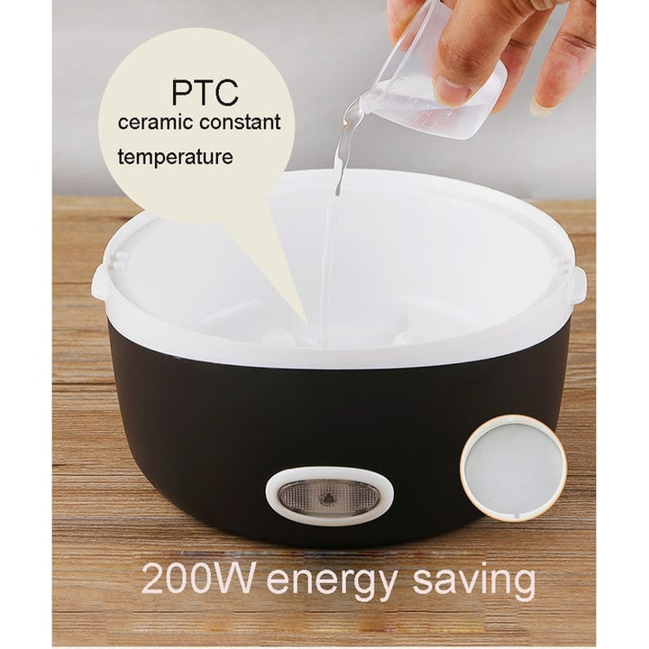 Unisex electric food container for warm meals. Features stainless steel bowls, perfect for busy workdays.