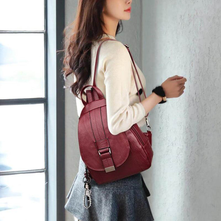 Waterproof anti-theft travel backpack for women, keeping belongings safe & dry in style.