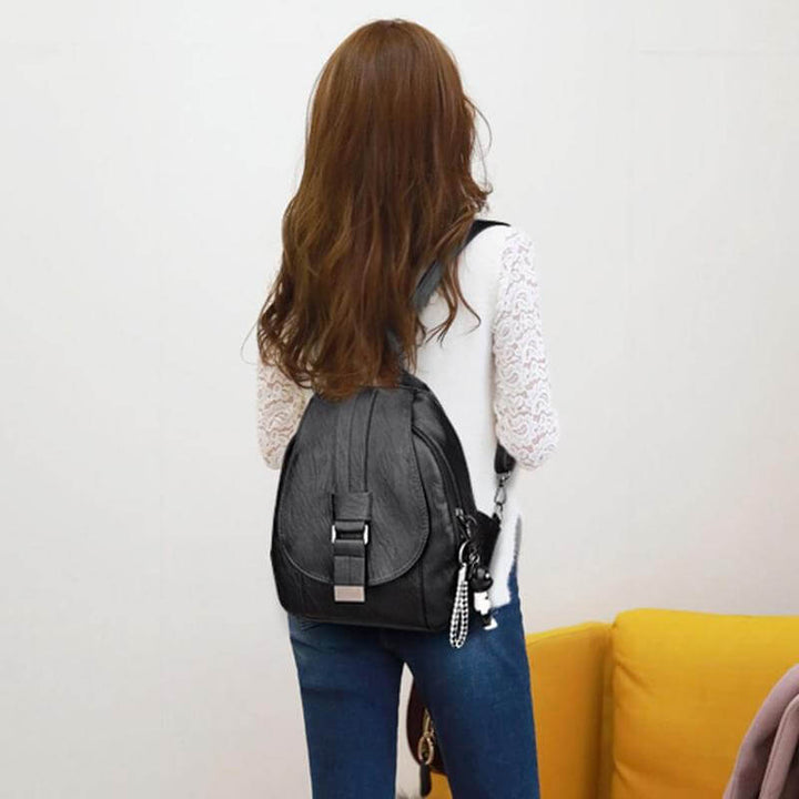 Modern women's secure anti-theft backpack, waterproof fabric ensures protection for all travels.