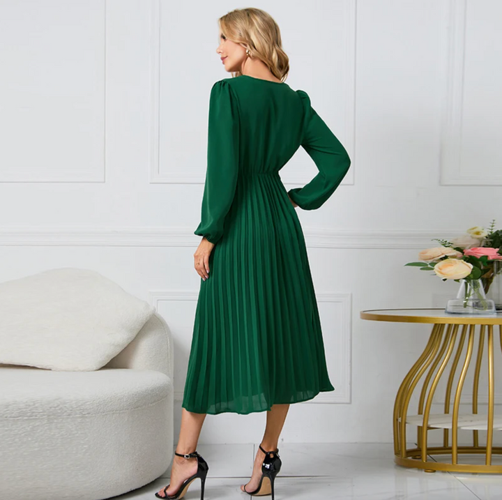 Elegant women's knee-length blazer dress, chic and sophisticated, suitable for office or special events.