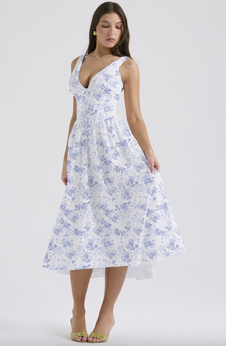 Comfortable women's floral sundress with pockets, a versatile and feminine choice for summer days.