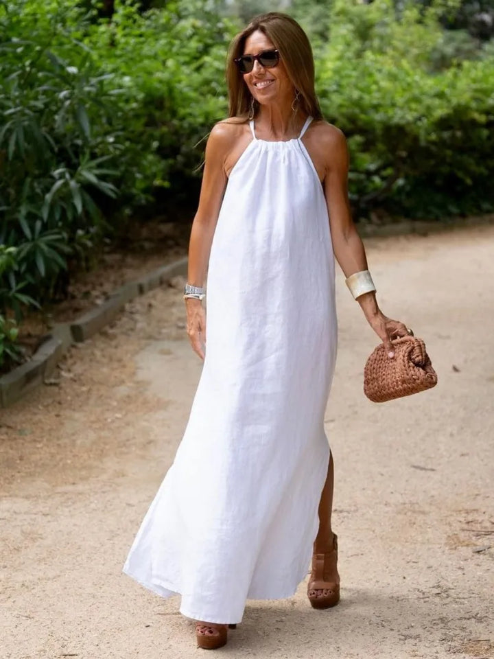 Sleeveless women's halter maxi dress, a flattering and long design perfect for summer fashion.