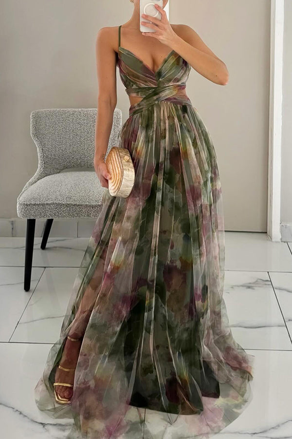 Women's sleeveless elegant maxi dress with spaghetti straps and a beautiful print, flowy summer style.