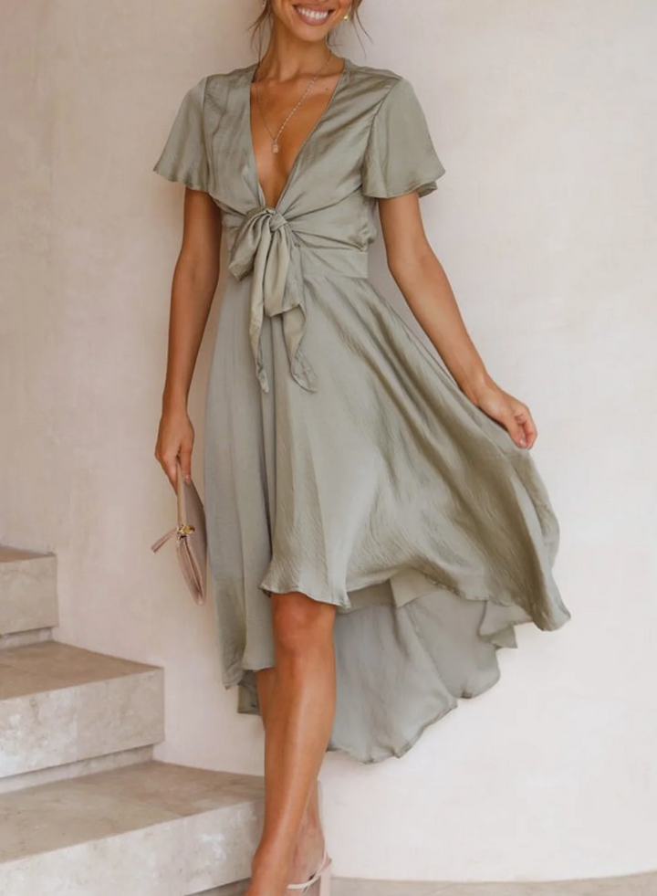 Elegant Amira women's summer midi dress, flowy short sleeve style for casual wear or party guest.
