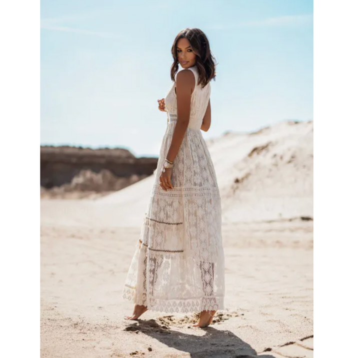 White elegant women's summer maxi dress, comfortable & stylish for vacation.