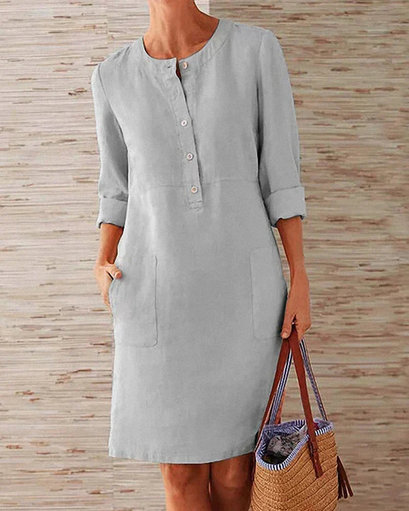 Elegant A-line summer dress for women, with stylish button detail. Perfect for versatile casual or office wear.