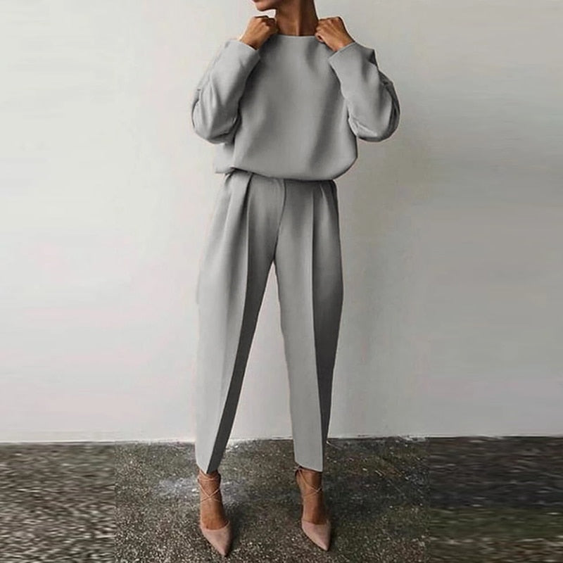 Chic women's matching two-piece set, ideal for versatile fashion, office wear, or smart casual outfits.