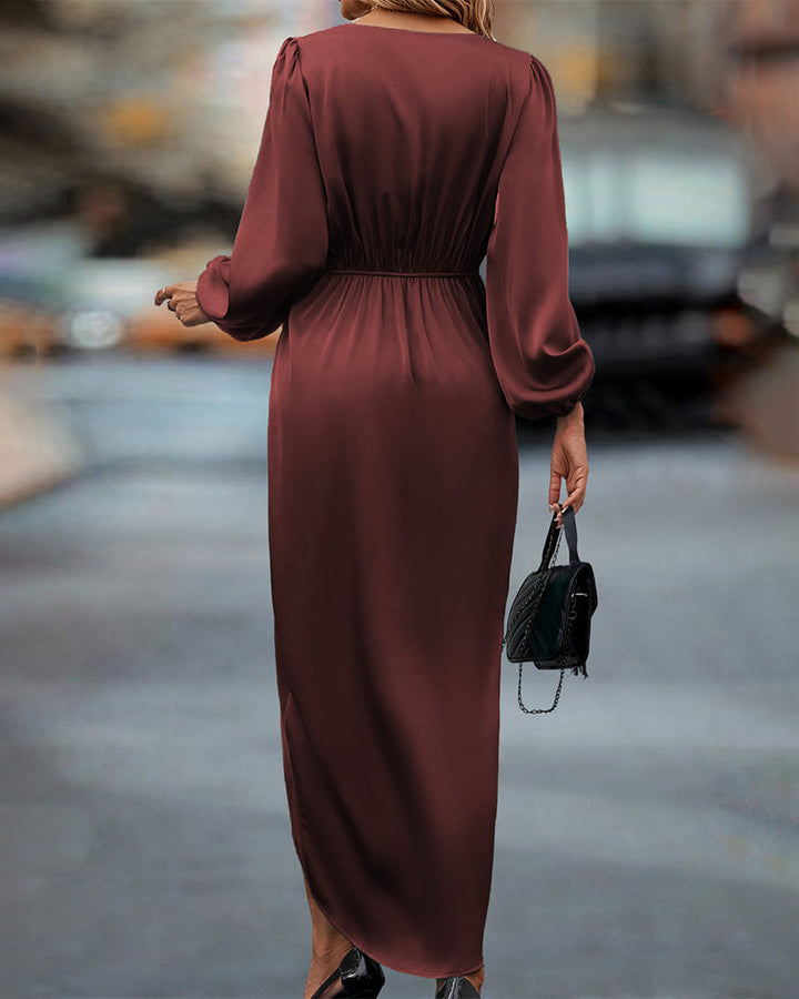 Women's elegant V-neck dress featuring stylish lantern sleeves & a flattering fit, great for any occasion.