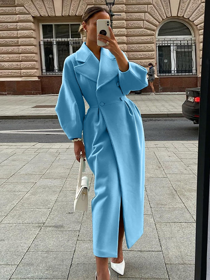 Elegant women's long double-breasted winter coat, ensuring warmth and classic style.