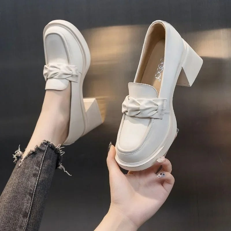 Elegant women's square heel shoes, perfect for office or formal events, offering all-day comfort. Versatile block heels.