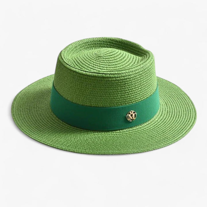Chic wide-brimmed straw hat for women, perfect for beach, travel, & sun protection this summer.