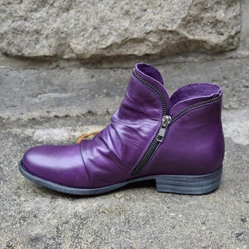 Chic women's orthopedic ankle boots featuring a stylish ruffle and practical side-zip closure.