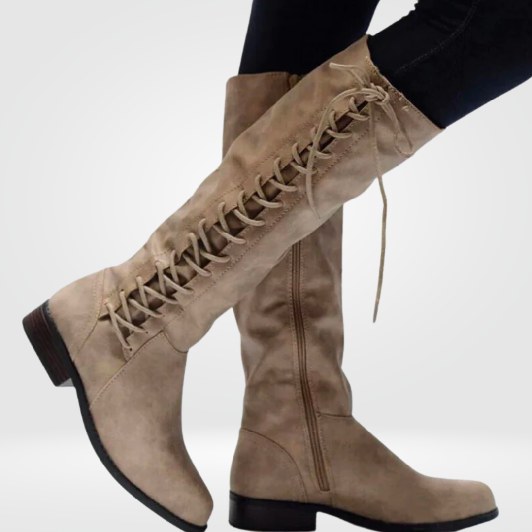 Elegant women's knee-high boots with a comfortable low block heel. Versatile fall & winter fashion footwear.