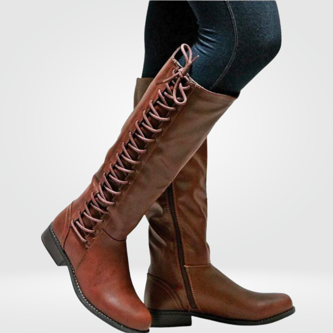 Chic women's knee-high boots for autumn & winter. Features a comfortable low block heel and non-slip sole.