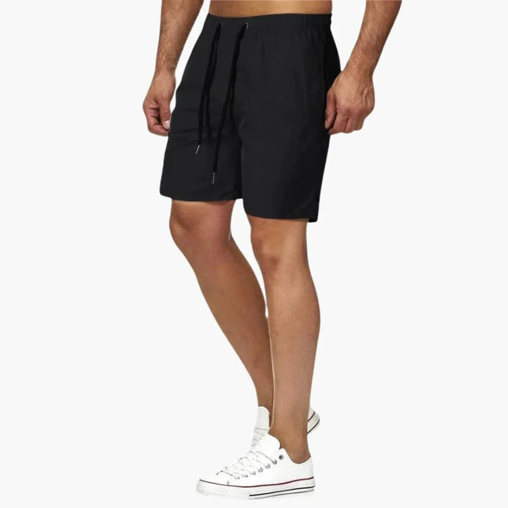 Men's quick-dry drawstring swimming shorts, ideal for beach and pool. Comfortable athletic summer wear.