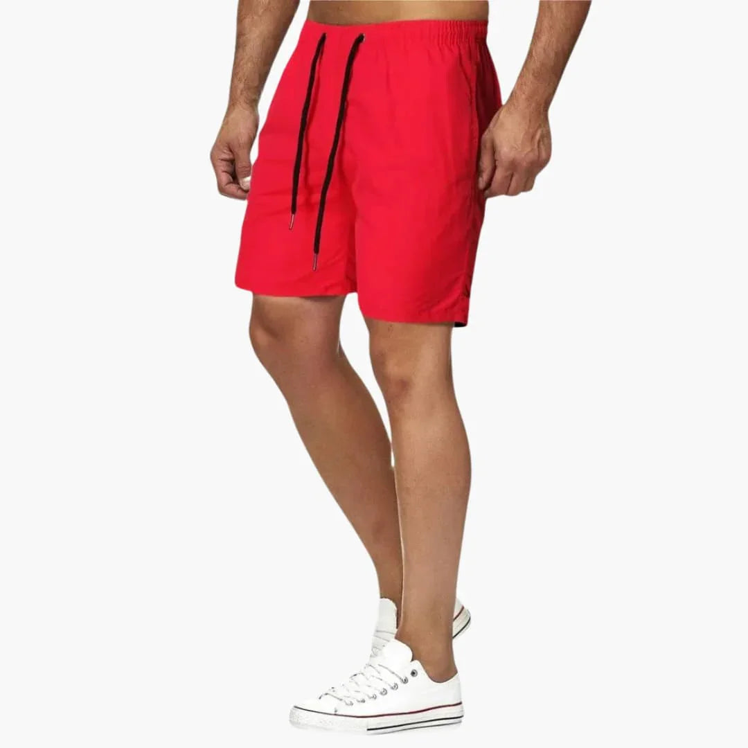Athletic men's quick-dry swimming shorts. Ideal for swimming, beach sports, and active pool days.