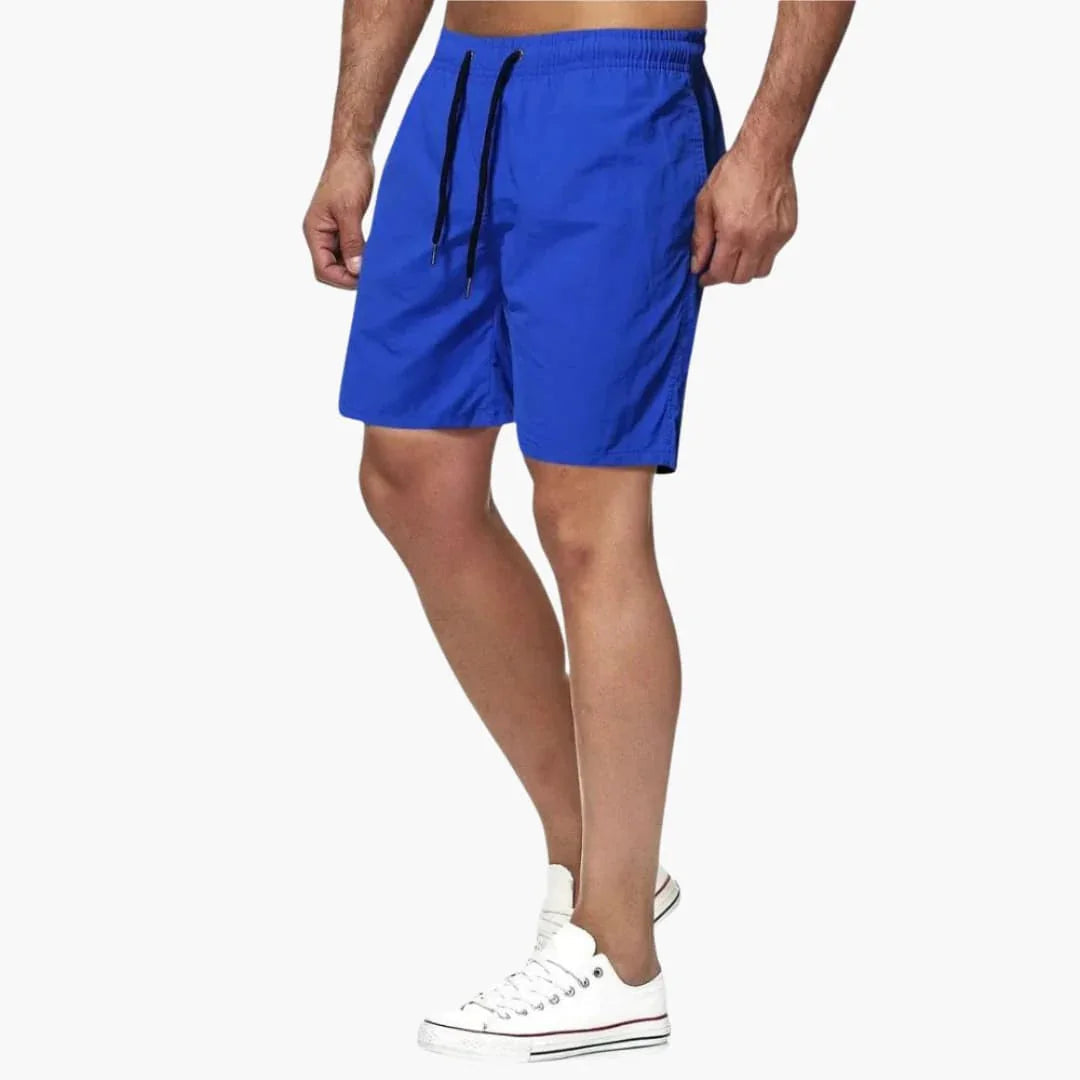 Comfortable men's quick-dry swim shorts with adjustable drawstring. Great for pool, beach, and summer fashion.