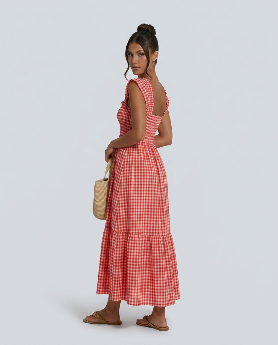 Stylish women's gingham maxi dress, comfortable and flowy, with pretty ruffle sleeves & smocked detail.