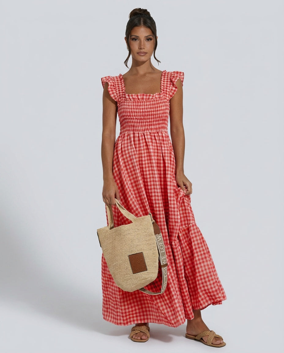 Day dress: Women's elegant gingham maxi dress with refined design, ruffle sleeves, and tiered skirt.