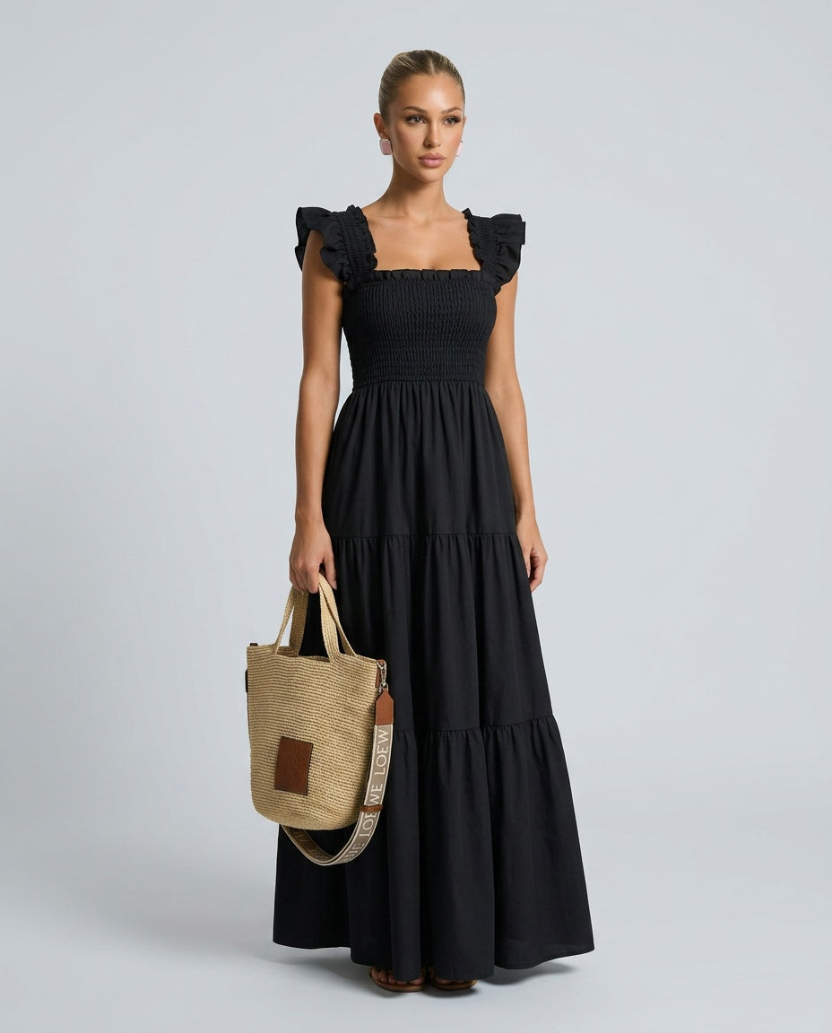 Elegant women's gingham maxi dress, a perfect day dress with smocked details and chic ruffle sleeves.