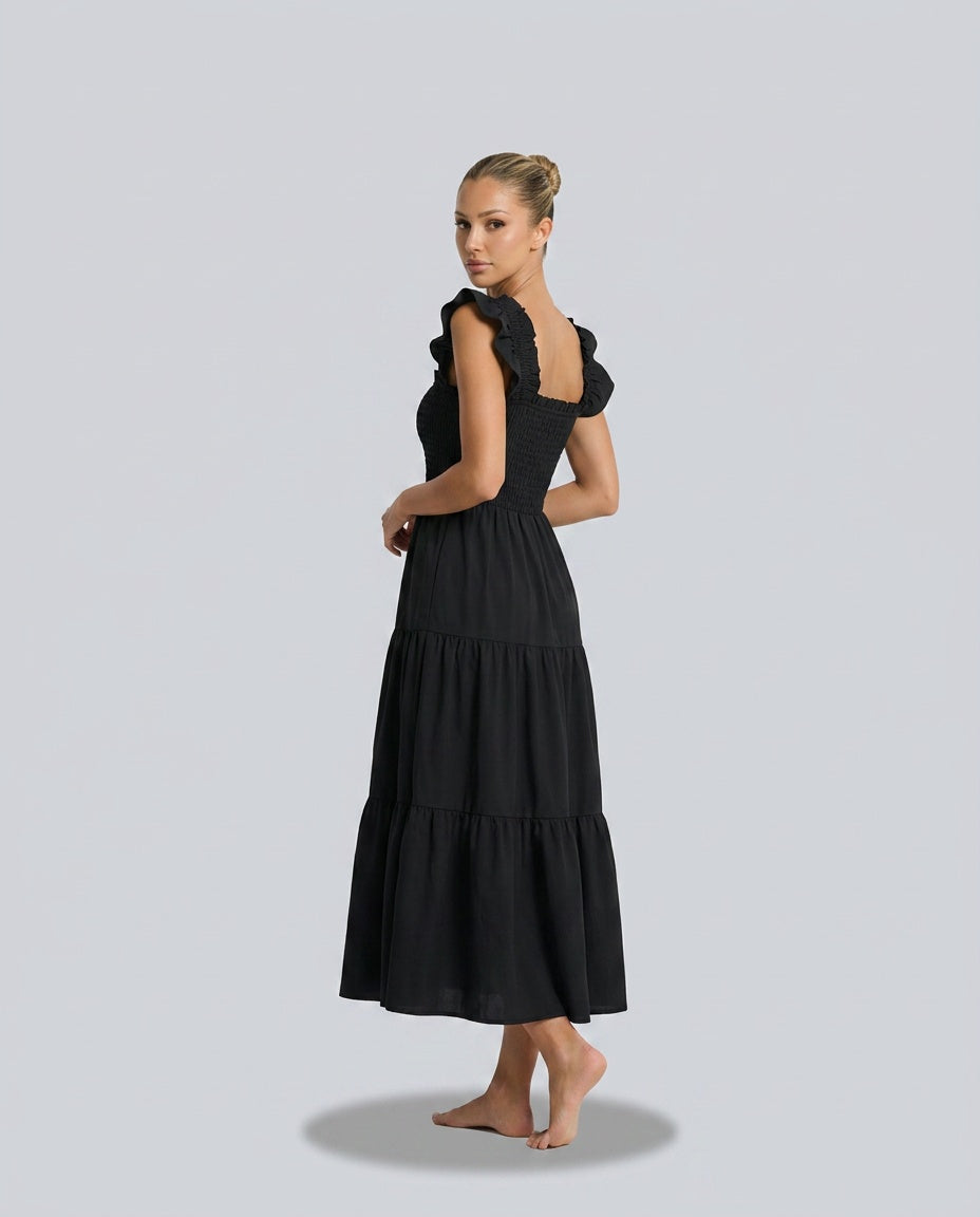 Summer women's refined gingham maxi dress with playful ruffle sleeves & comfortable flowy design.