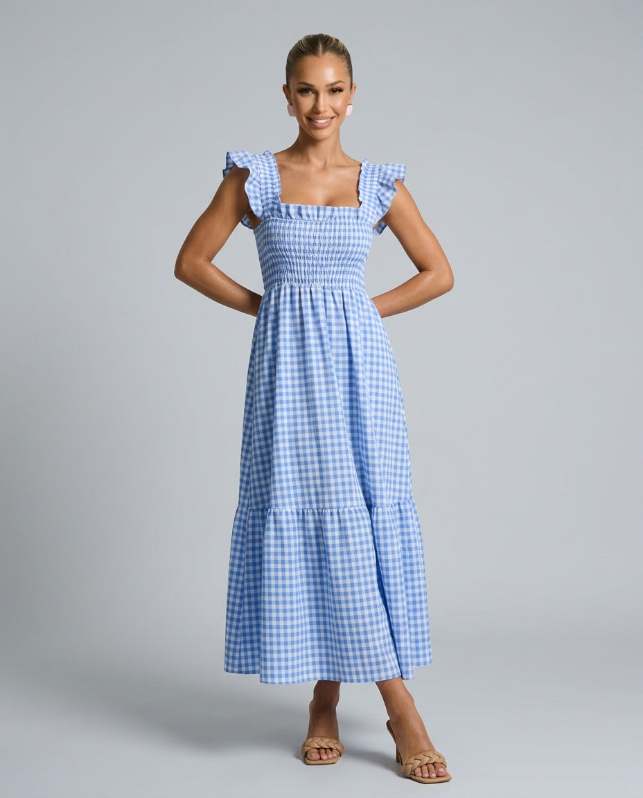 Women's versatile gingham maxi dress, featuring smocking, tiered skirt, and fashionable ruffle sleeves.