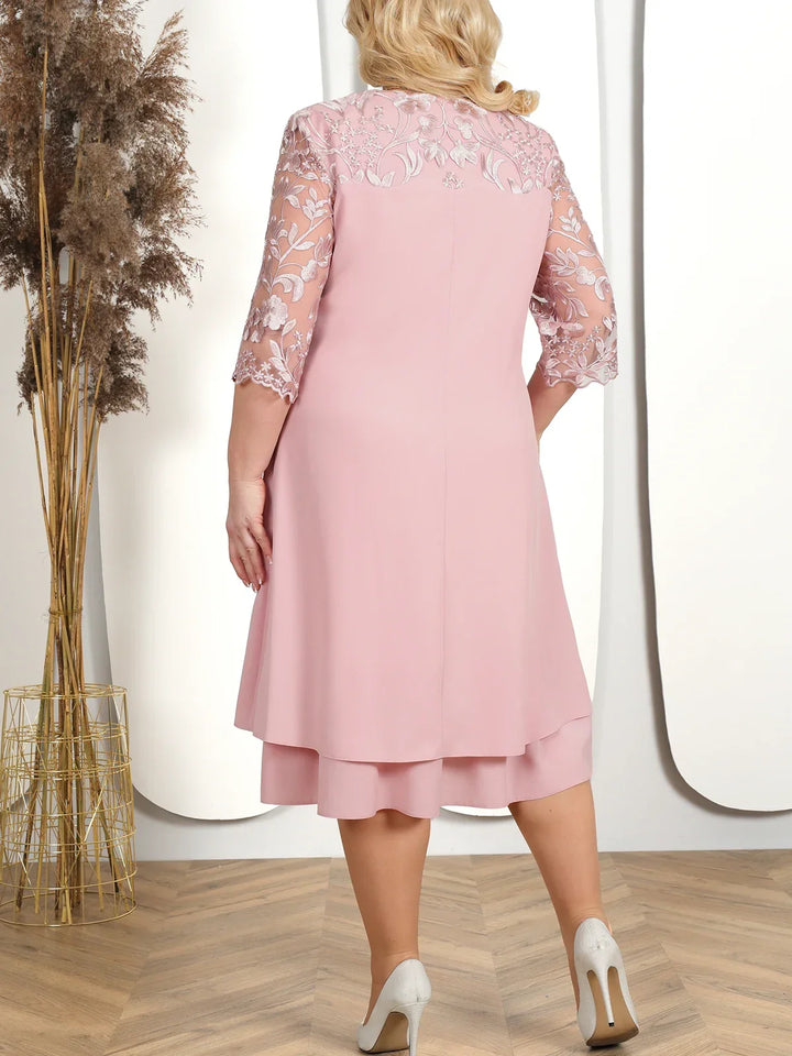 Flattering plus-size embroidered banquet dress, an elegant formal gown for women's special parties.