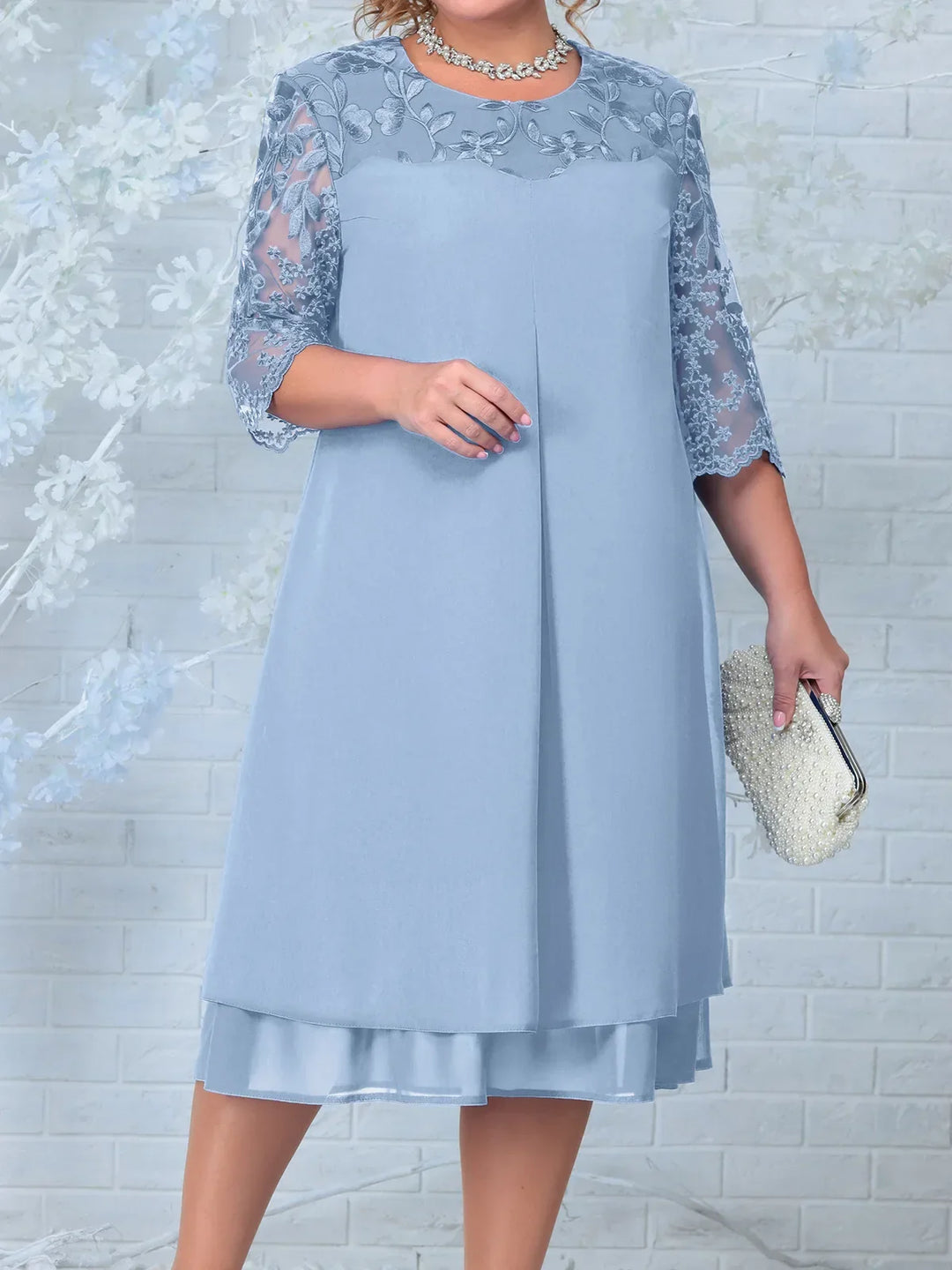 Formal women's plus-size dress for special occasions, featuring beautiful floral embroidery.