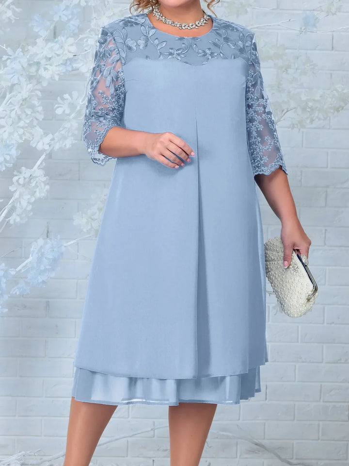 Formal women's plus-size dress for special occasions, featuring beautiful floral embroidery.