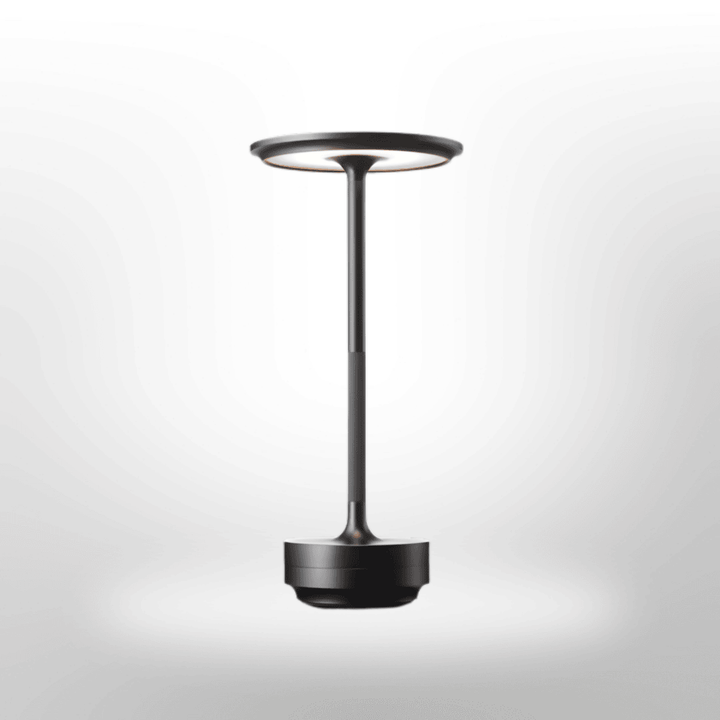Sleek minimalist rechargeable LED table lamp, cordless, enhances any room's decor.