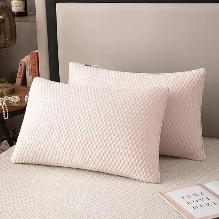 Pink cooling ergonomic neck pillow for restful sleep. Offers excellent neck support & comfort for side sleepers.