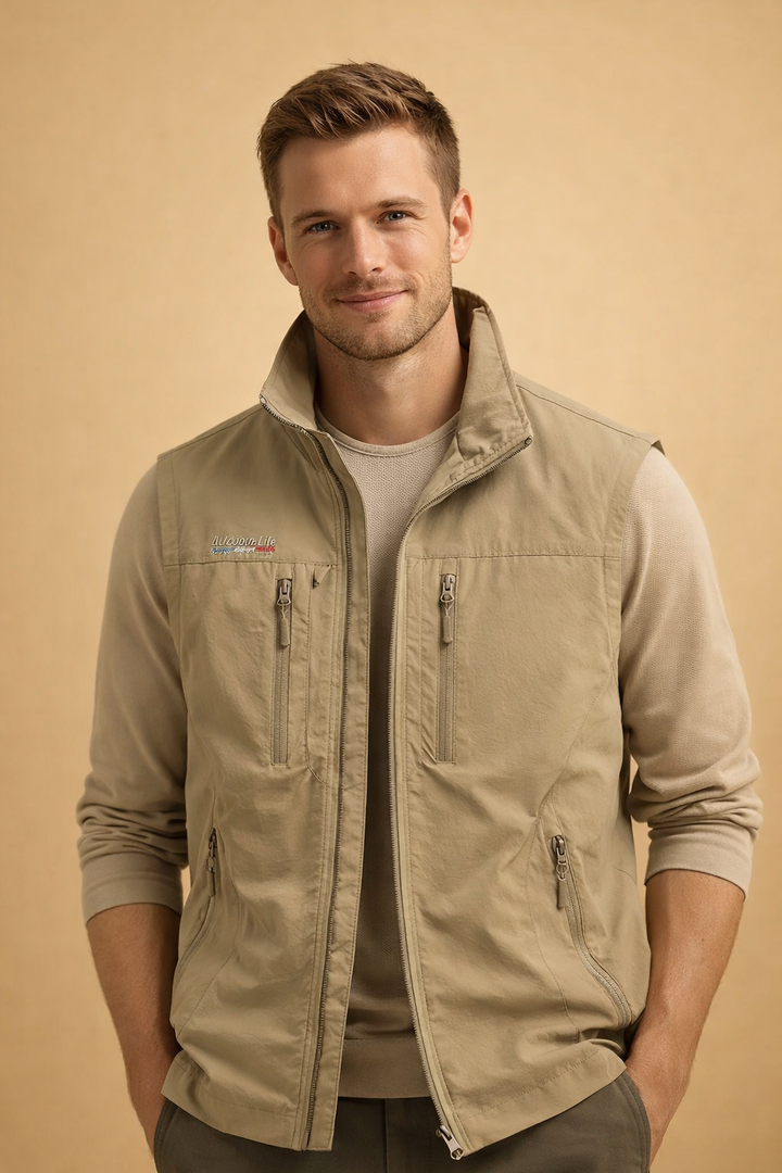 Rugged men's utility vest, durable multi-pocket design. Perfect sleeveless jacket for outdoor activities & travel.