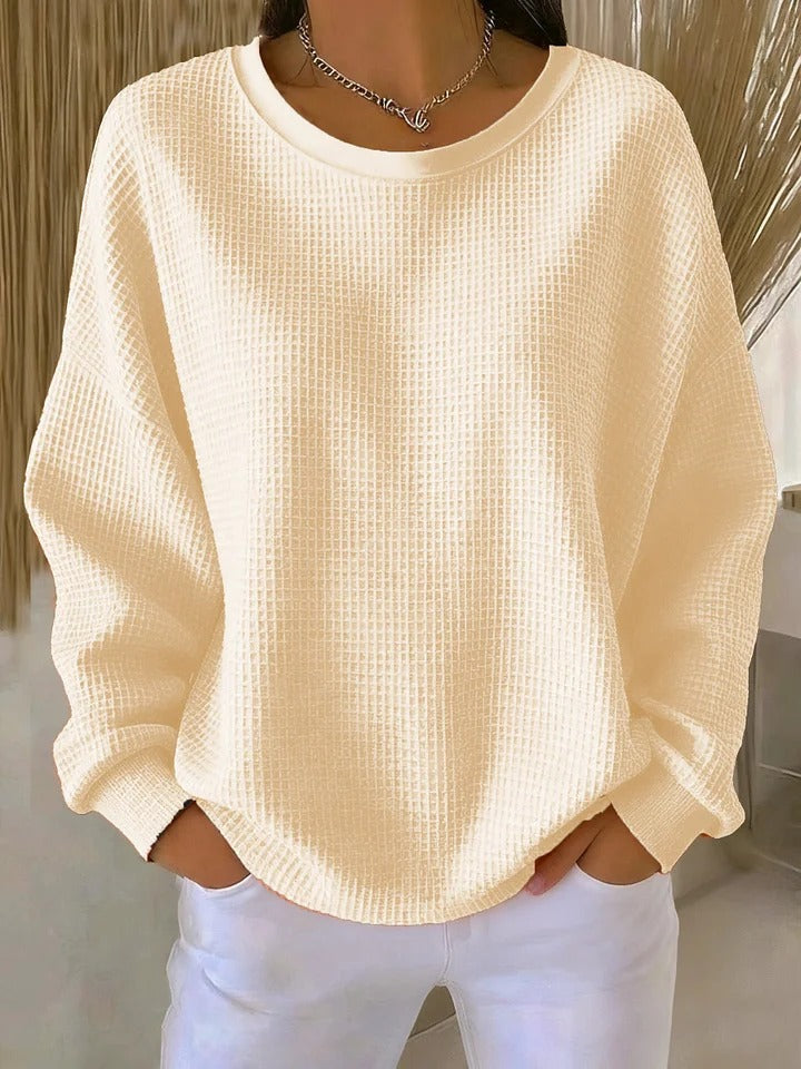 Chic women's textured long sleeve pullover sweater, ideal for a cozy, casual look.