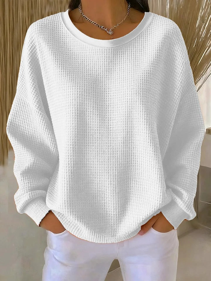 Stylish women's long sleeve textured sweater, a cozy pullover for everyday winter fashion.