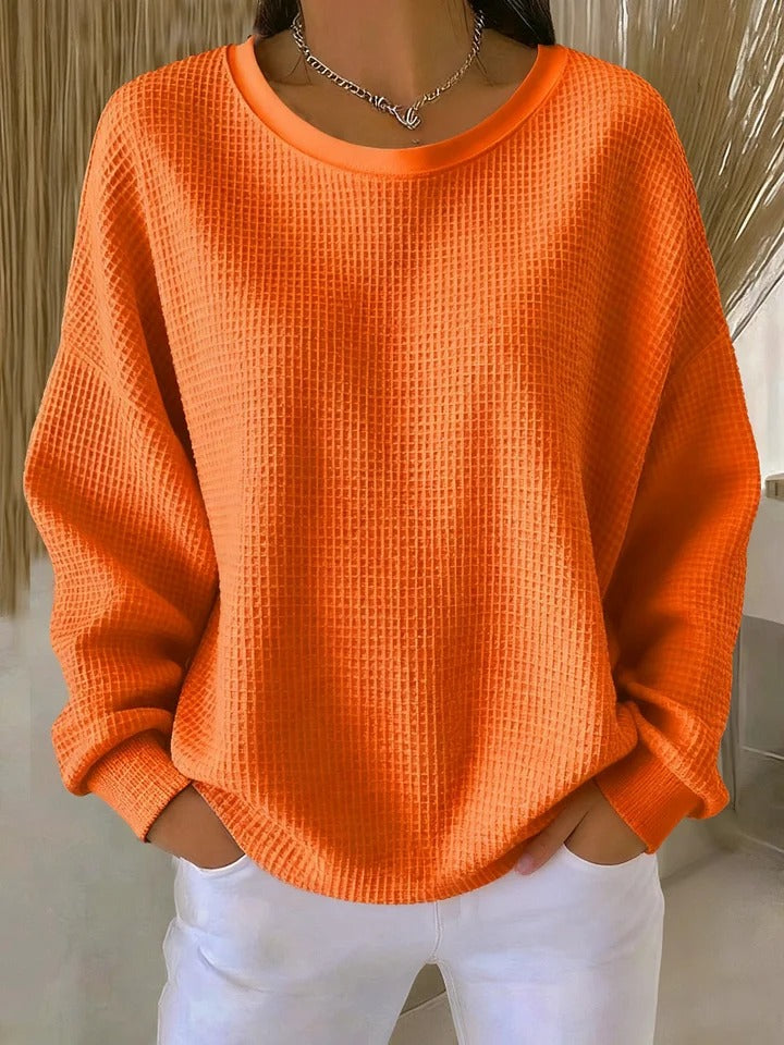 Essential women's cozy textured long sleeve pullover, great for winter and casual outings.