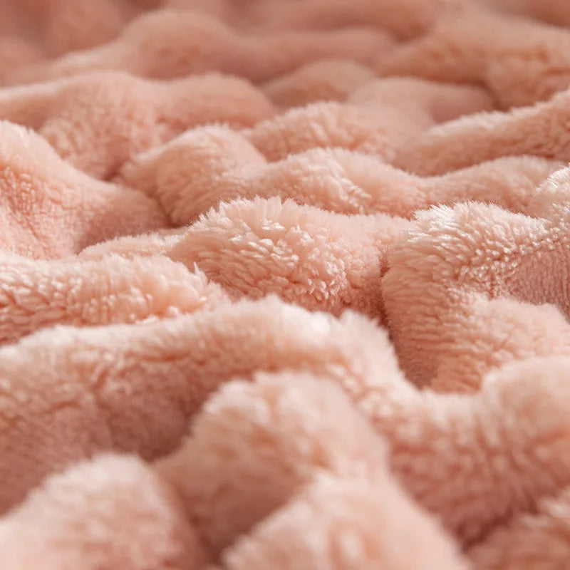Warm & ultra soft flannel throw blanket with a stylish bubble texture, perfect for any home.